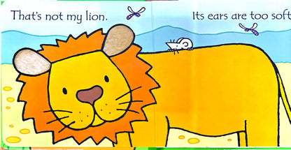 That's not my lion... (Board book)